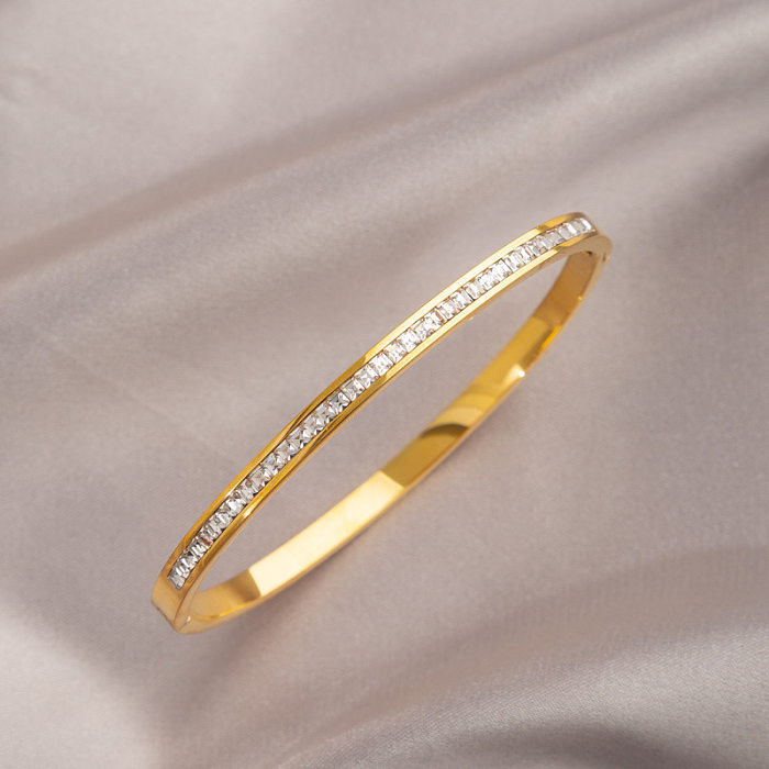 Estilo simples estilo clássico redondo cobra titânio chapeamento de aço incrustado zircão pulseira banhada a ouro 18K