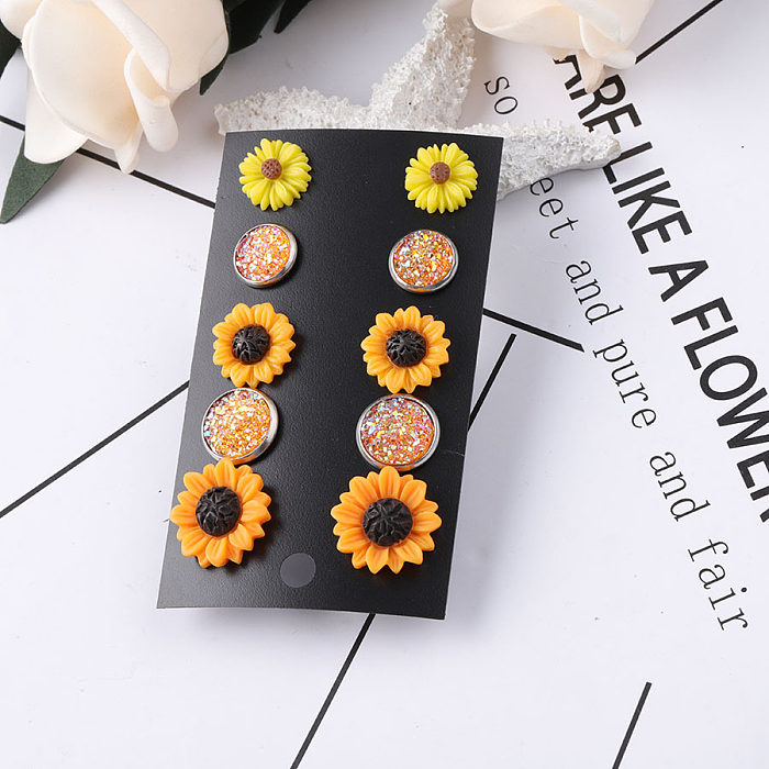 1 Set pastorale Sonnenblumen-Ohrstecker aus Edelstahl, rund, Kunstharz