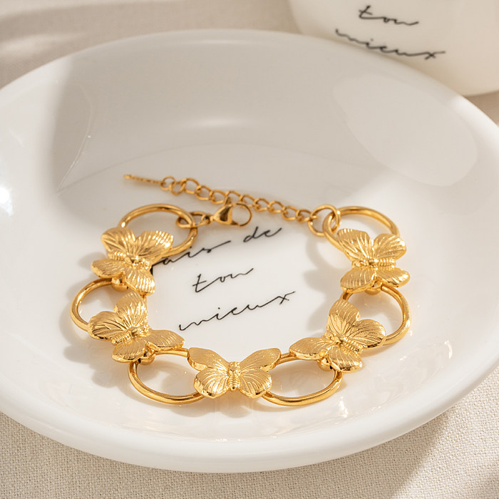 Pulseras chapadas en oro de 18 quilates con revestimiento de acero inoxidable de mariposa de estilo simple