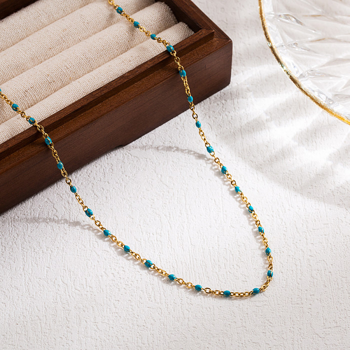 Lässige, runde, mit 18 Karat vergoldete Emaille-Halskette aus Edelstahl für den Urlaub