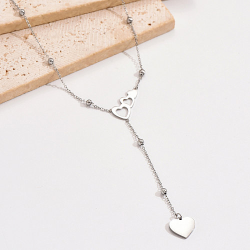 Elegante romantische einfache Art-Herz-Form-Edelstahl-Ketten-Halskette mit ausgehöhltem Anhänger