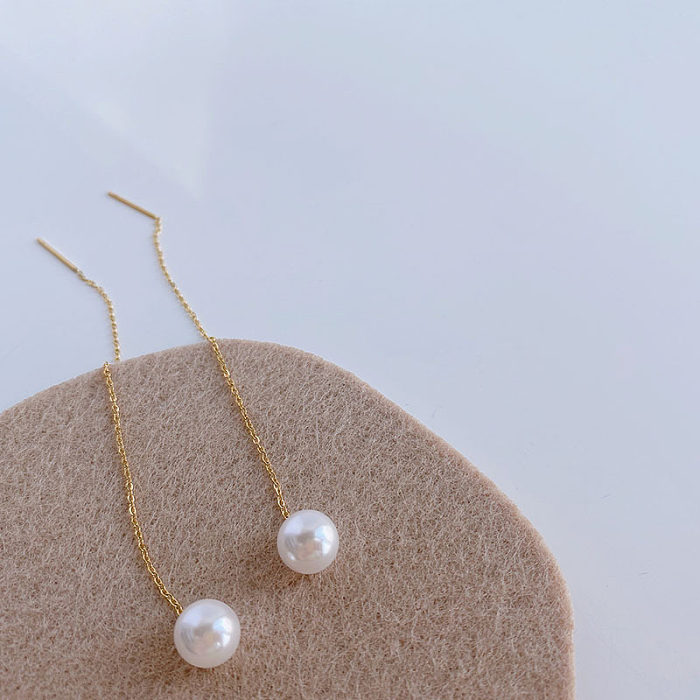 Línea de oreja de perla con incrustaciones de revestimiento de acero inoxidable con borlas de estilo simple 1 par
