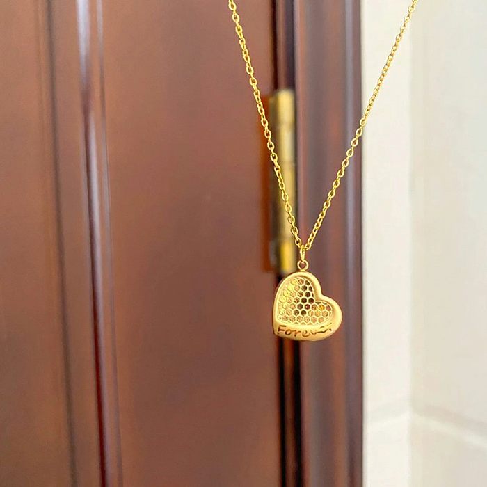 Collier pendentif plaqué or 18 carats en acier inoxydable de couleur unie en forme de cœur de style simple