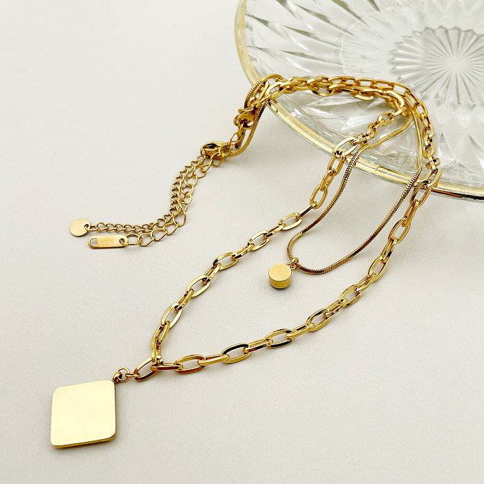 Collier pendentif plaqué or en Zircon avec incrustation de placage en acier inoxydable en forme de losange de Style Simple