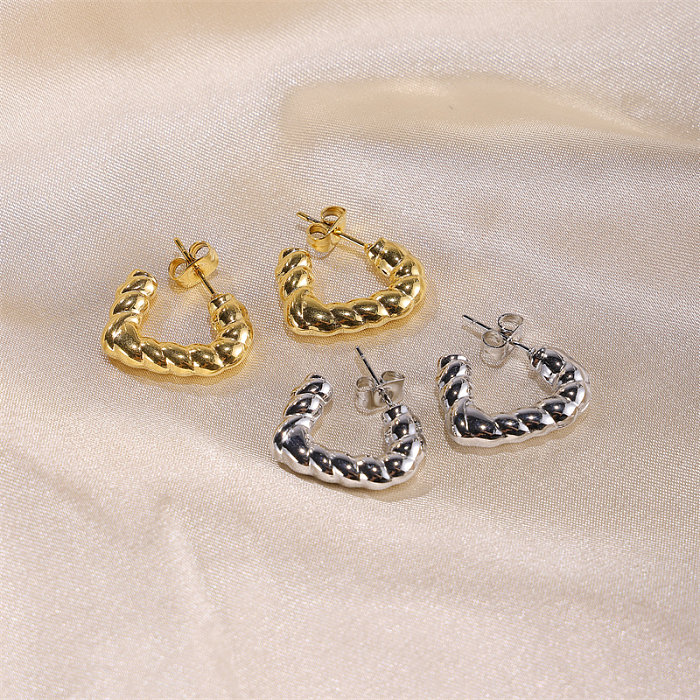 1 par de pendientes chapados en oro de 18 quilates de acero inoxidable chapado en forma de corazón de estilo clásico elegante