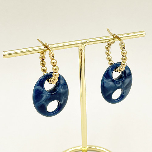 1 Paar kunstvolle, ovale, mit Perlen überzogene, vergoldete Ohrhänger aus Edelstahl