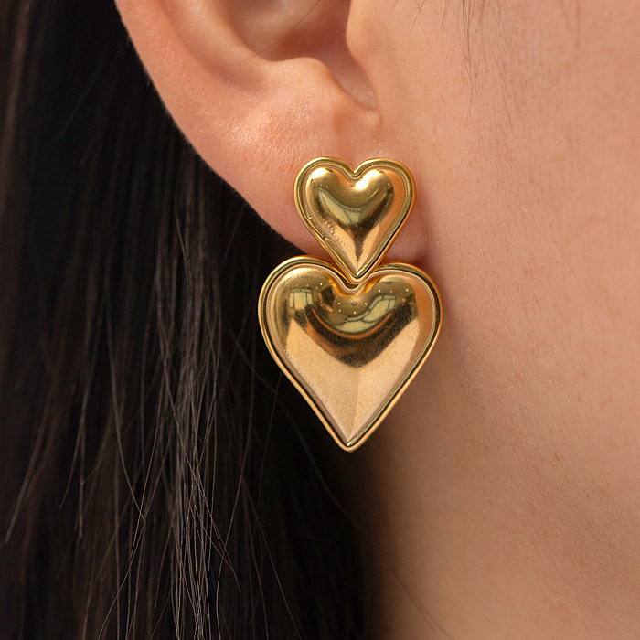 1 paire de boucles d'oreilles pendantes plaquées en acier inoxydable en forme de cœur de Style INS
