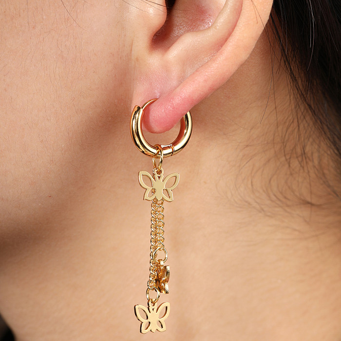 1 paire de boucles d'oreilles pendantes en acier inoxydable plaqué papillon à la mode