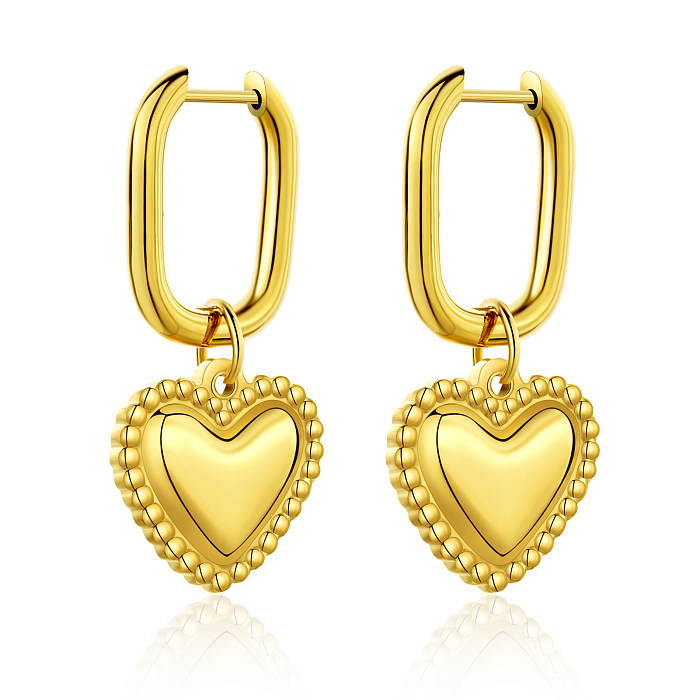 1 par de pendientes chapados en oro y acero inoxidable con forma de corazón y cruz de estilo clásico