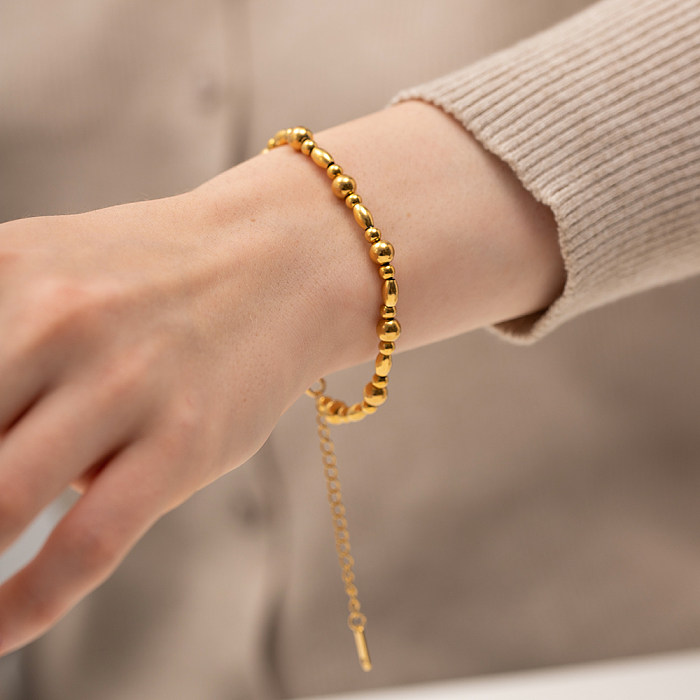 Elegantes pulseiras redondas banhadas a ouro 18K com revestimento de aço inoxidável