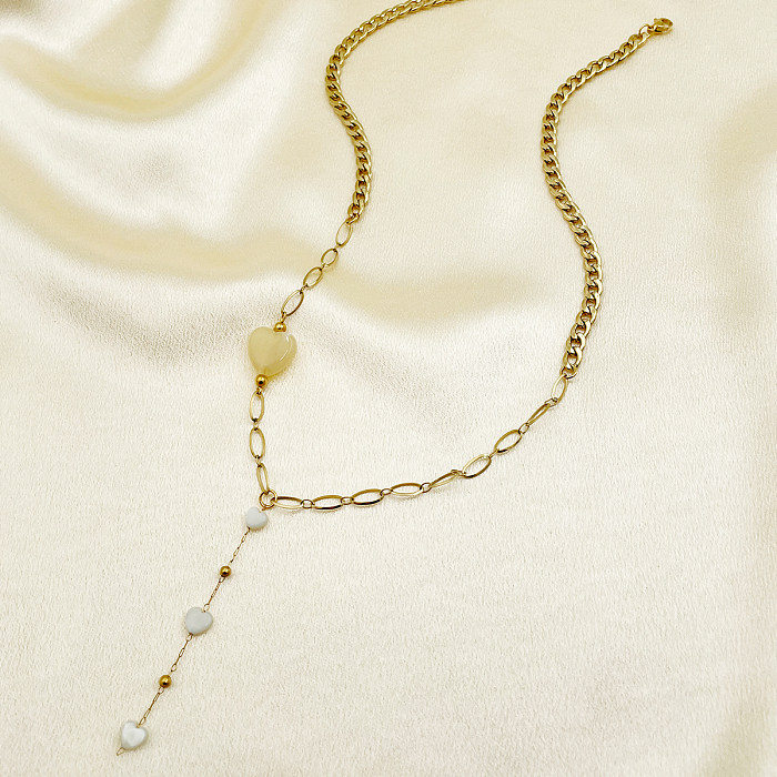 Glamouröse, schlichte, künstlerische herzförmige Halskette aus Edelstahl mit Quastenbeschichtung und 14-Karat-Vergoldung
