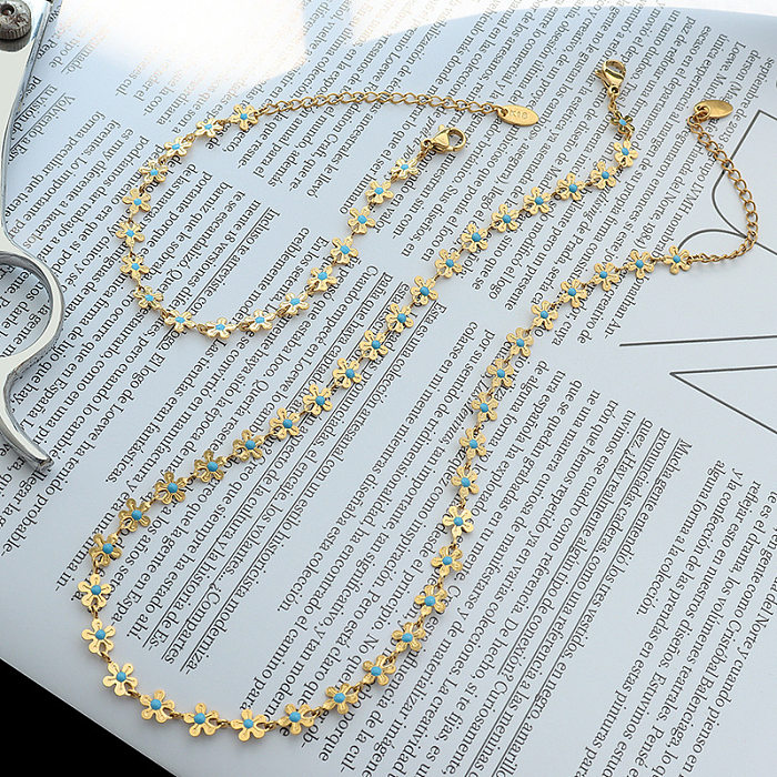 INS europäisches und amerikanisches personalisiertes Goldblau mit Blumen-Tropfenöl-Halsketten-Titanstahl-überzogenem 18K-Echtgold-Armband-Set P075-E012