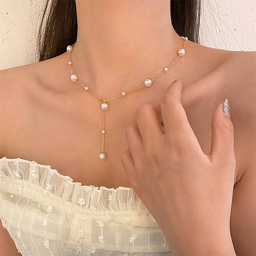 Elegante collar geométrico de perlas artificiales con borlas de acero inoxidable