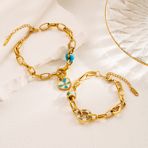 Lässige, süße, schlichte, runde herzförmige Armbänder aus Titanstahl mit vergoldeter Beschichtung