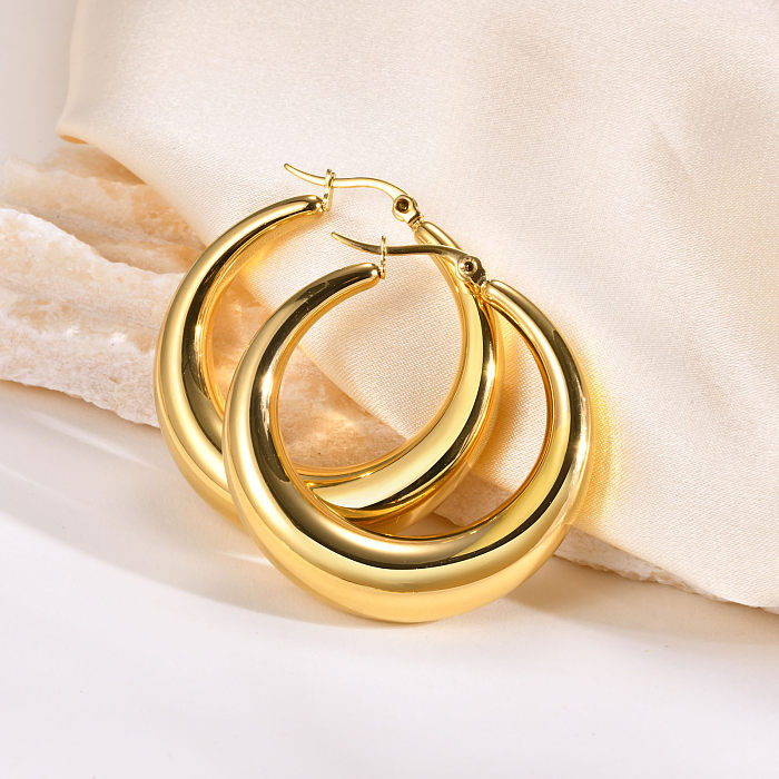 1 par de brincos de argola banhados a ouro de aço inoxidável com revestimento de cor sólida estilo simples