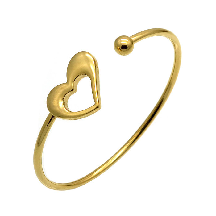 Atacado estilo simples formato de coração pulseira banhada a ouro 18K de aço titânio