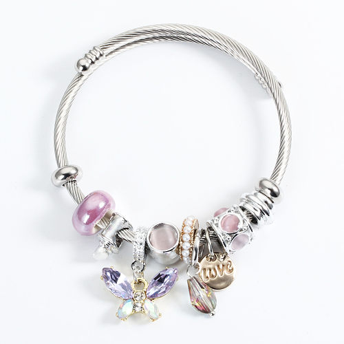 Brazalete de perlas artificiales de cristal artificial chapado en acero de titanio con mariposa de amor dulce