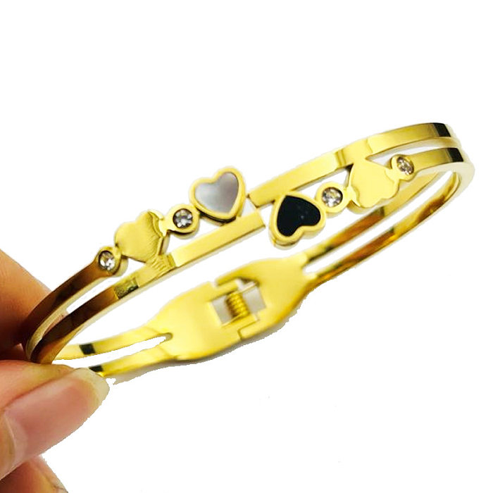 Bracelet plaqué or 18K de placage d'acier inoxydable de forme de coeur de style simple