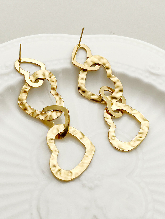 1 par de pendientes colgantes chapados en oro de acero inoxidable pulido en forma de corazón de estilo Simple romántico informal