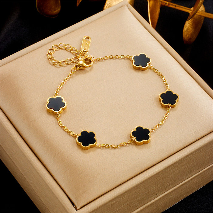 Bracelets plaqués or 18 carats en acier titanique de fleur brillante de Madame