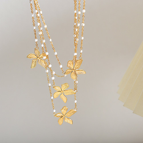 Collar colgante chapado en oro de 18 quilates con revestimiento de esmalte de acero inoxidable y perla artificial de flor dulce