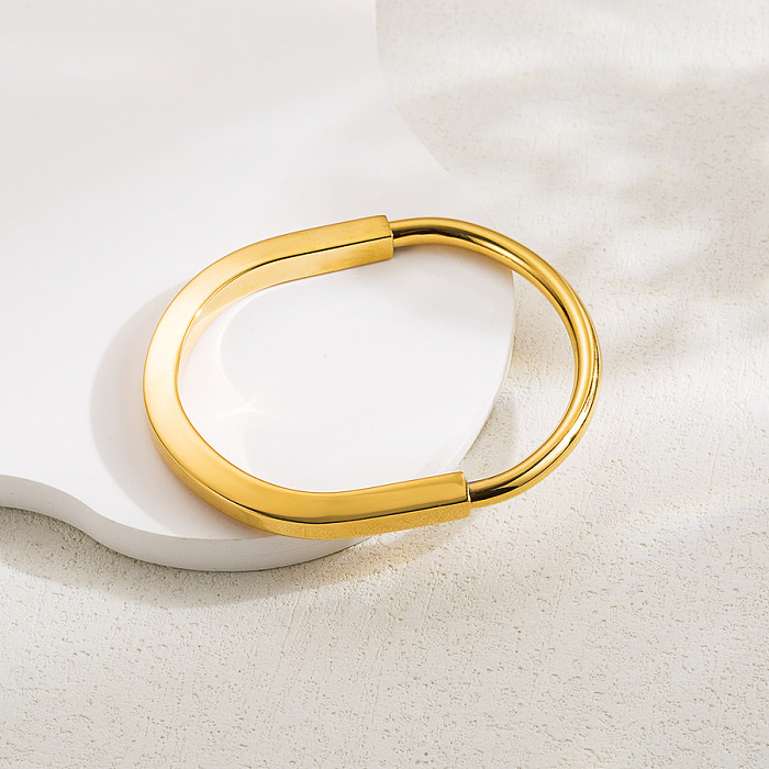 Brazalete chapado en oro de 18 quilates con hebilla de acero inoxidable de color sólido ovalado estilo IG al por mayor