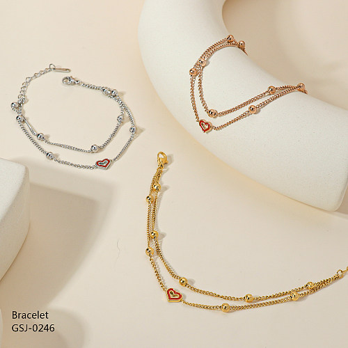 Retro-Armbänder im klassischen Retro-Stil in Herzform aus Edelstahl mit geschichteten Strasssteinen, rosévergoldet, vergoldet, versilbert
