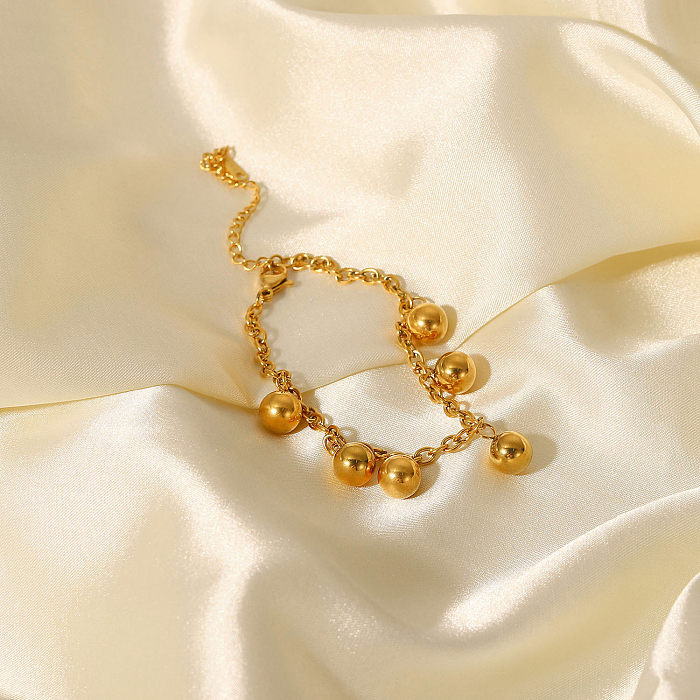 Armband mit goldenem Kugelanhänger im Retro-Stil, Edelstahl, 18 Karat vergoldet