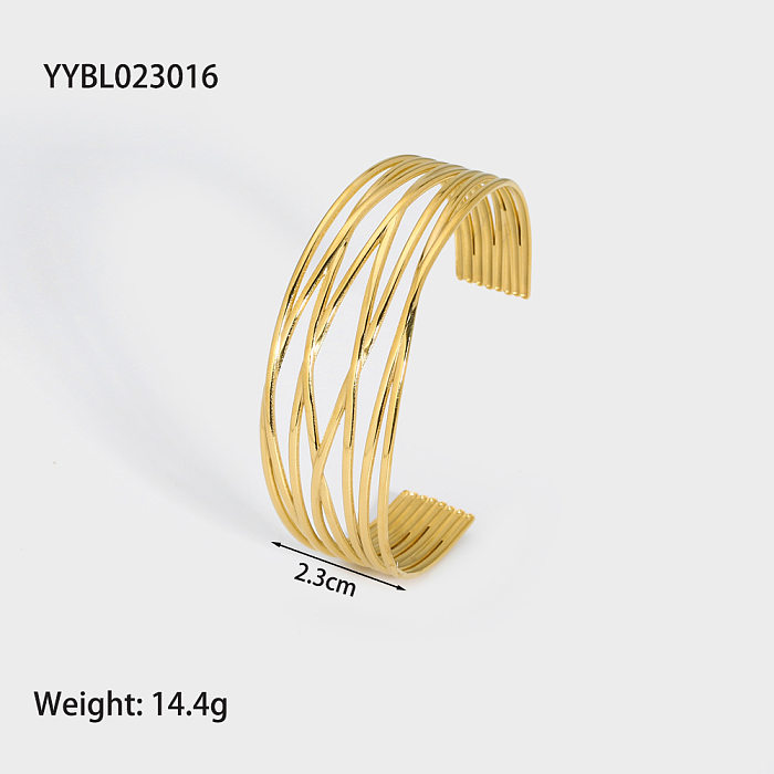 Moderner, geometrischer, herzförmiger Schlangen-Armreif mit Edelstahlbeschichtung und vergoldetem Armreif