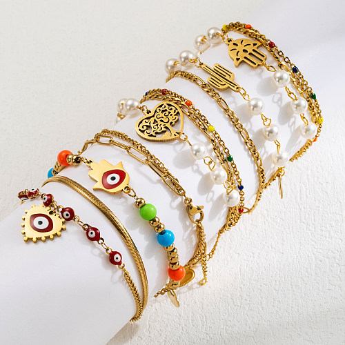 Bracelets en forme d'oeil du diable, Style INS, en forme de cœur, en acier inoxydable, Imitation de perles, plaqués or, vente en gros
