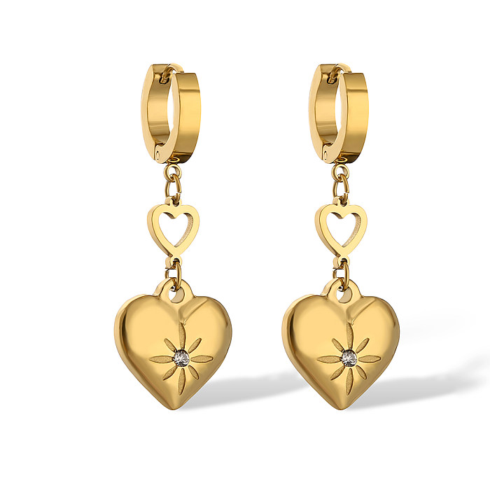1 par de pendientes colgantes chapados en oro de 18K con incrustaciones de circonita de acero inoxidable con forma de corazón de viaje de estilo Simple