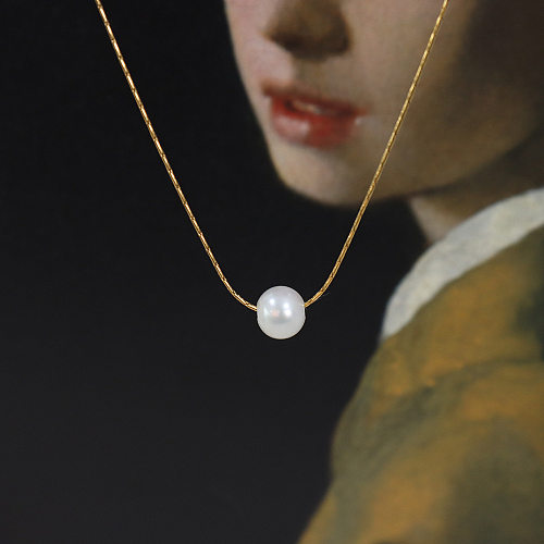 Collier avec pendentif en perles d'eau douce, petite jupe en acier inoxydable, mode rétro