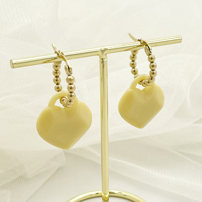 1 Paar lässige elegante Pendel-Ohrringe in Herzform aus vergoldetem Edelstahl