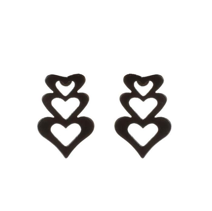 1 par de pendientes huecos chapados en acero inoxidable con forma de corazón y estrella con letras a la moda