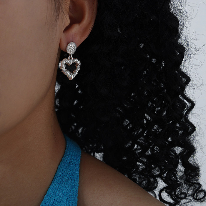 1 paire de boucles d'oreilles pendantes élégantes et artistiques en forme de cœur plaquées en acier inoxydable plaqué or 18 carats