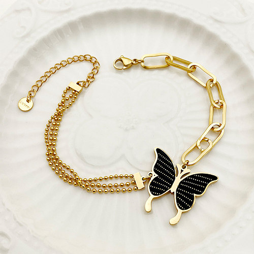 Pulseiras banhadas a ouro de aço inoxidável borboleta estilo simples doce a granel