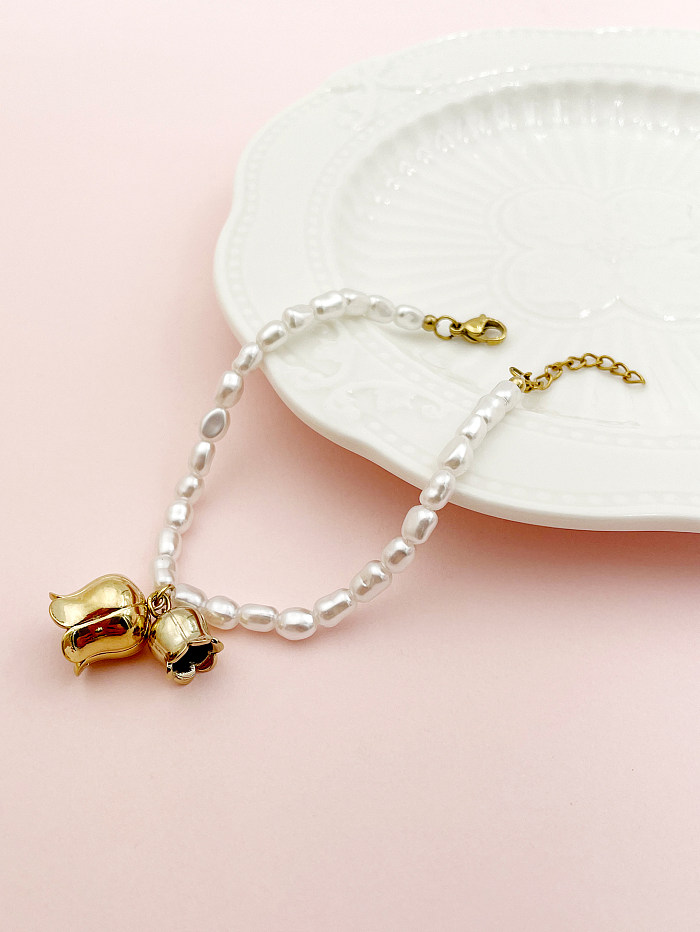 Pulseras chapadas en oro de 14 quilates con revestimiento de perlas de imitación de acero inoxidable Glam Lady Flower