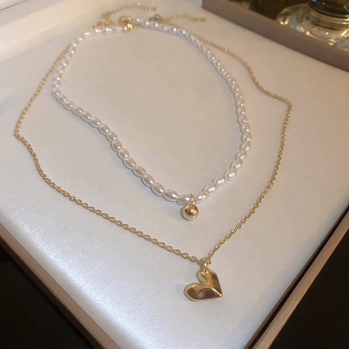 Collar de diamantes de imitación de perlas artificiales con incrustaciones geométricas elegantes de acero inoxidable