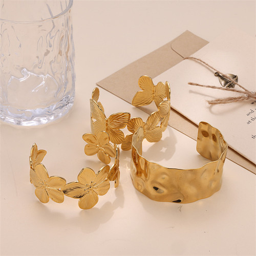 Bracelet luxueux en placage d'acier inoxydable avec fleur et papillon