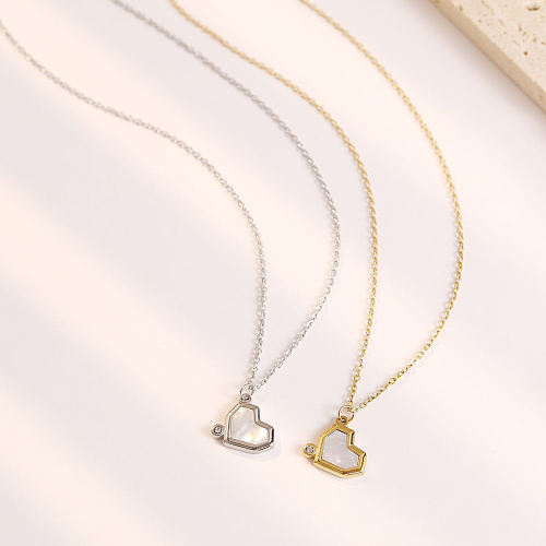 Collar con colgante chapado en oro blanco con incrustaciones de incrustaciones de acero inoxidable en forma de corazón de estilo simple