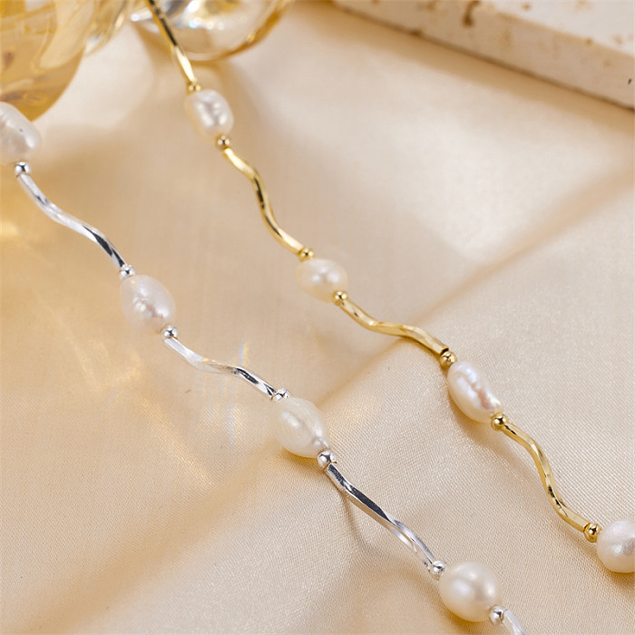 Schlichter Commute-Stil, runde Halskette aus Edelstahl mit Süßwasserperlenbeschichtung und 18-Karat-Vergoldung