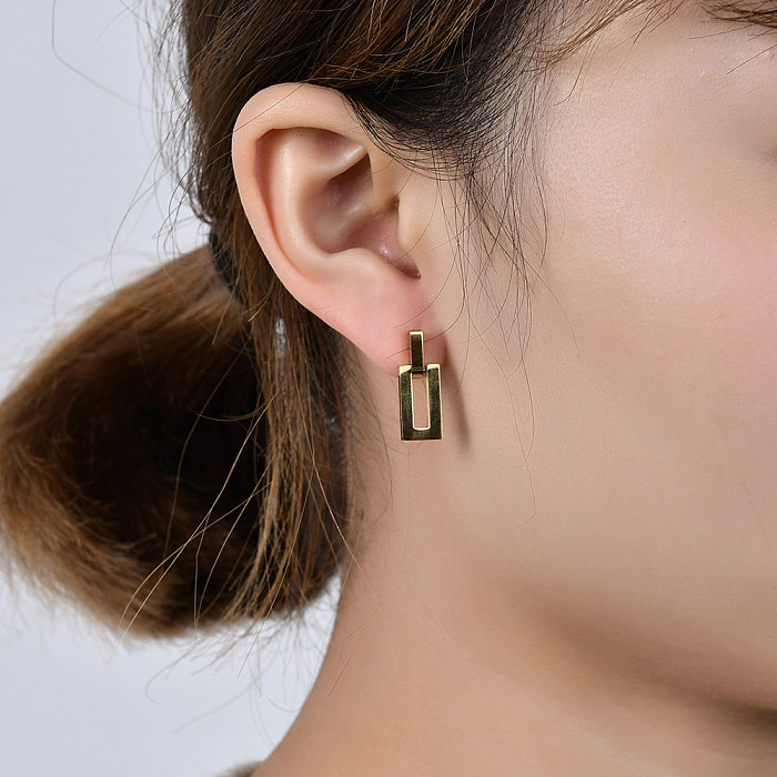 Boucles d'oreilles en acier inoxydable à pendentif rectangulaire creux géométrique à la mode