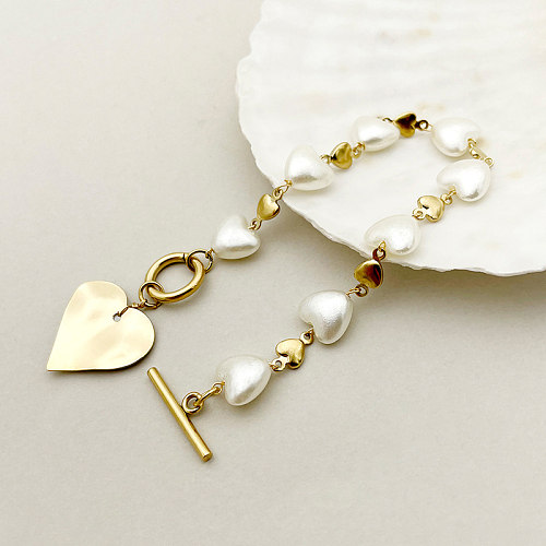 Pulseiras banhadas a ouro com revestimento de aço inoxidável em formato de coração estilo simples casual