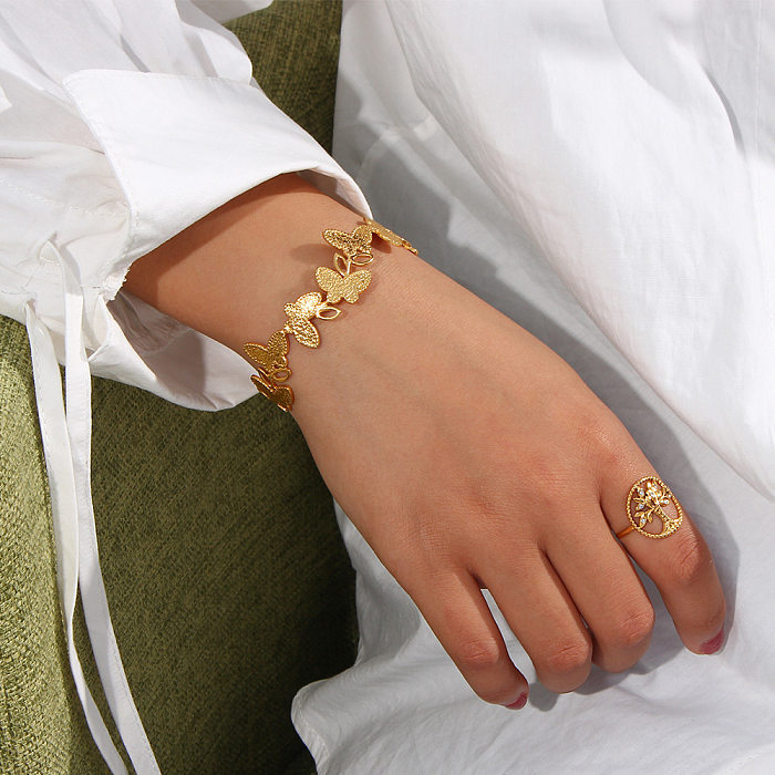 Pulsera de moda con adorno, pulsera de mariposa de extremo abierto chapada en acero inoxidable de oro de 18 quilates