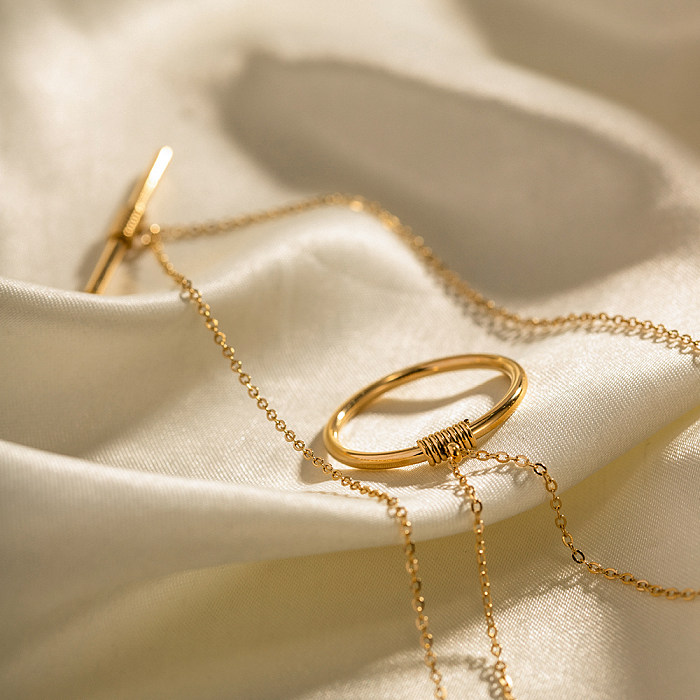 Collares acodados chapados en oro redondos de acero inoxidable de estilo simple