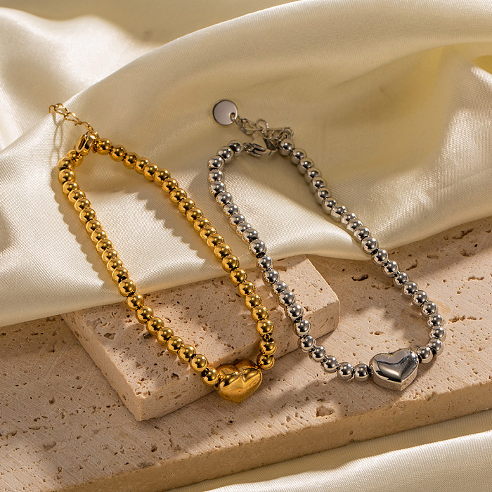 Pulseras chapadas en oro con revestimiento de acero inoxidable en forma de corazón de estilo clásico