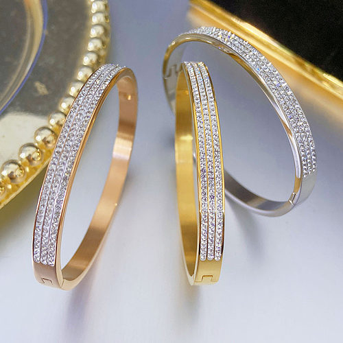 Brazalete de diamantes de imitación con incrustaciones de acero de titanio y círculo brillante