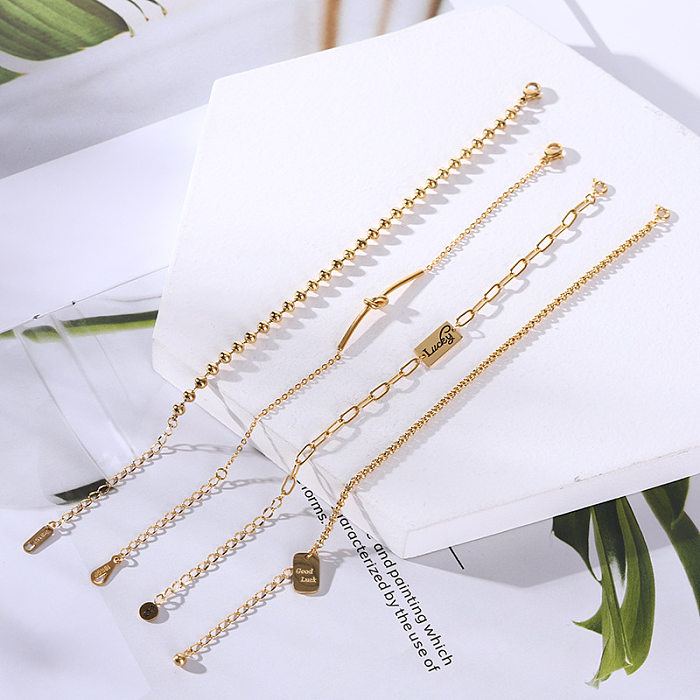Simple Style Four Leaf Clover Heart Shape Daisy Titanium Steel Inlay Artificial Pearls Bracelets