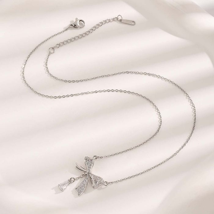 Glamouröse, schlichte, schlichte Halskette mit Schleifenknoten-Anhänger aus Edelstahl mit Inlay-Zirkon-Anhänger