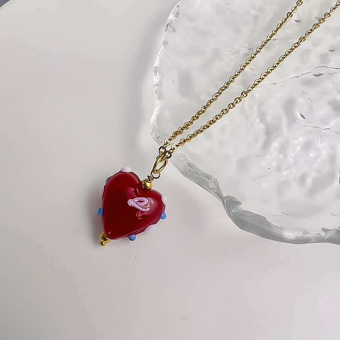 Collier pendentif plaqué or en verre d'acier inoxydable en forme de cœur doux en vrac